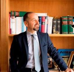 Simone Calzolai, Esq.